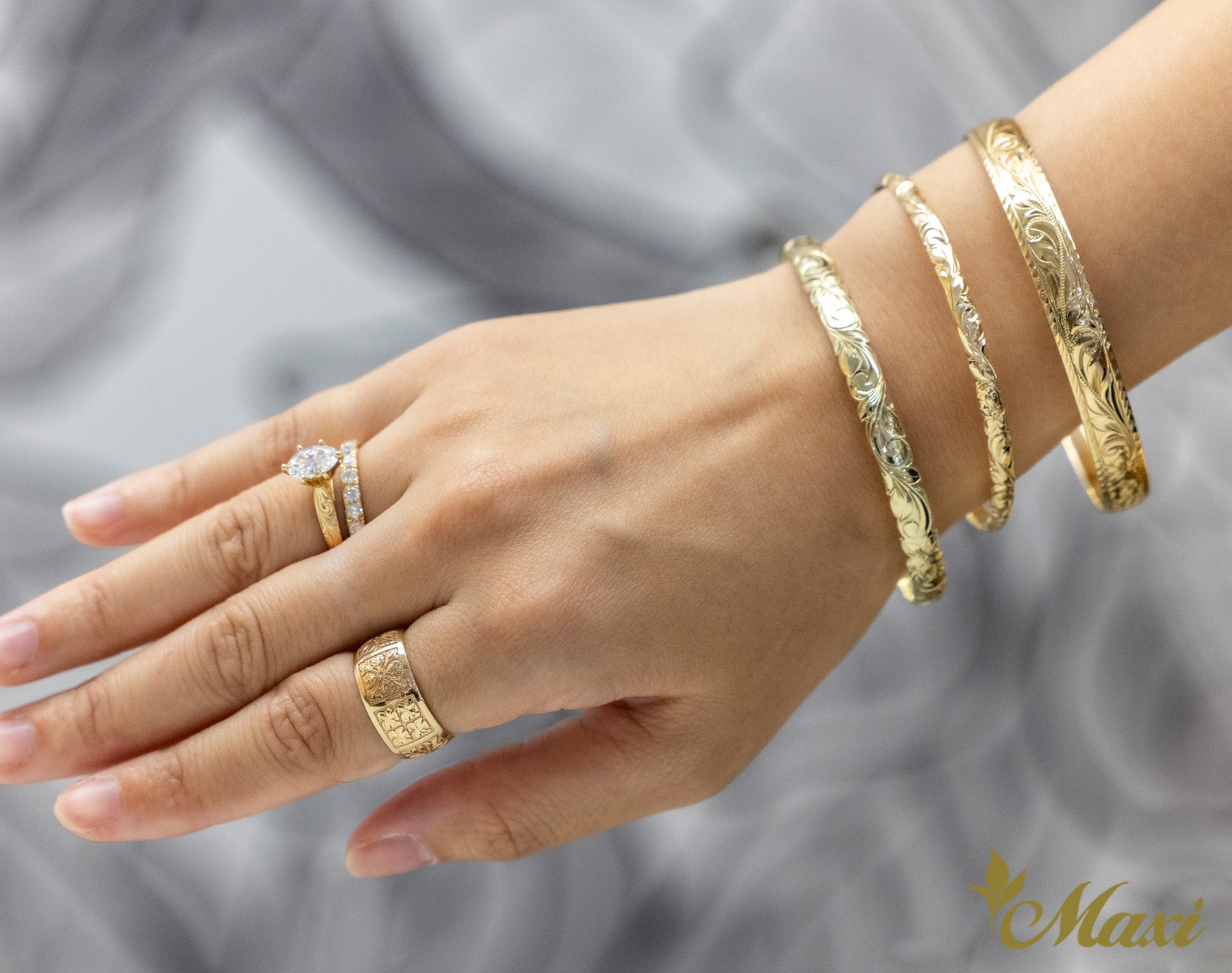 1 Carat Oval Lab-Grown Diamond Hawaiian Engraved Solitaire_ Tapered Ring [14K/18K Gold]